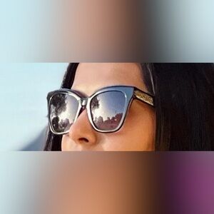 Longchamp Elegant Black Sunglasses with brown case